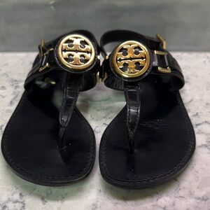 Tory Burch Black and Gold medallion Sandals size 5